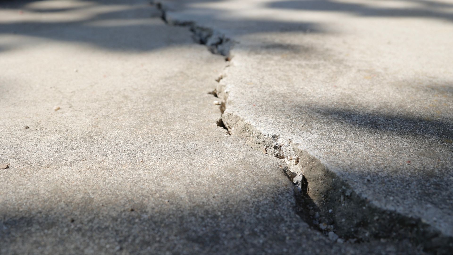 Crack in concrete indicating structural damage