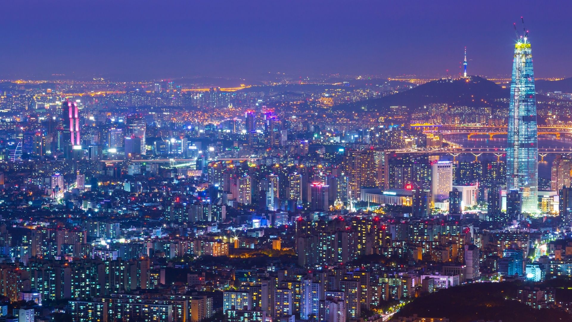Night-time skyline of a brightly lit city