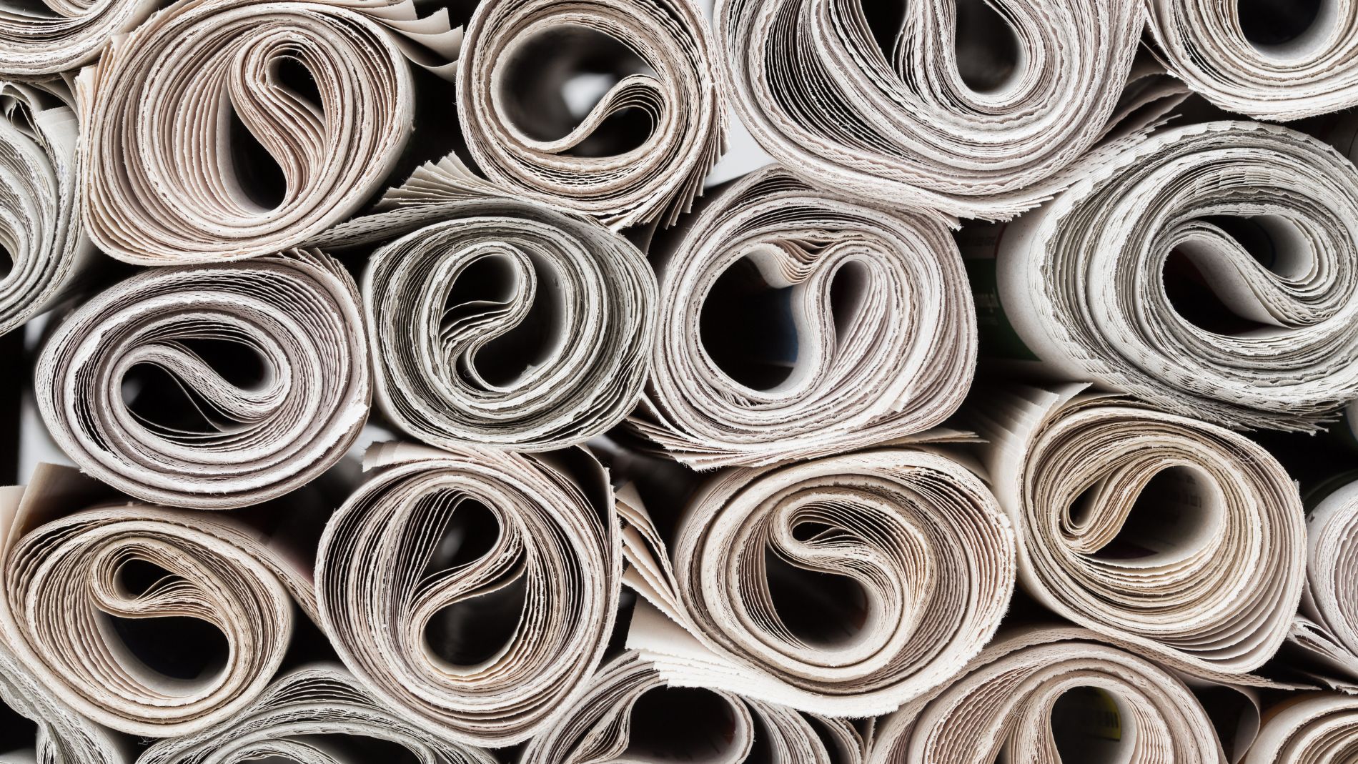 Stack of rolled newspapers