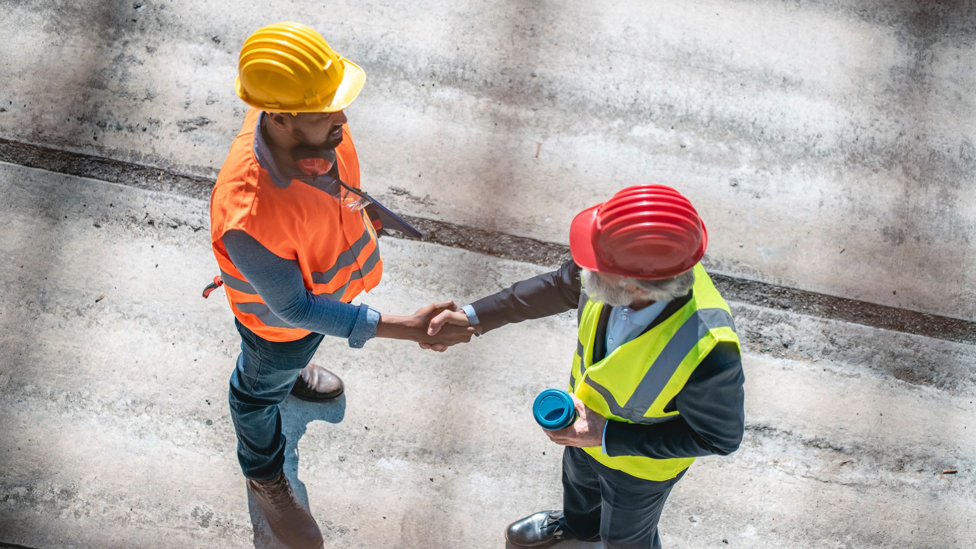 Handshake of two workers