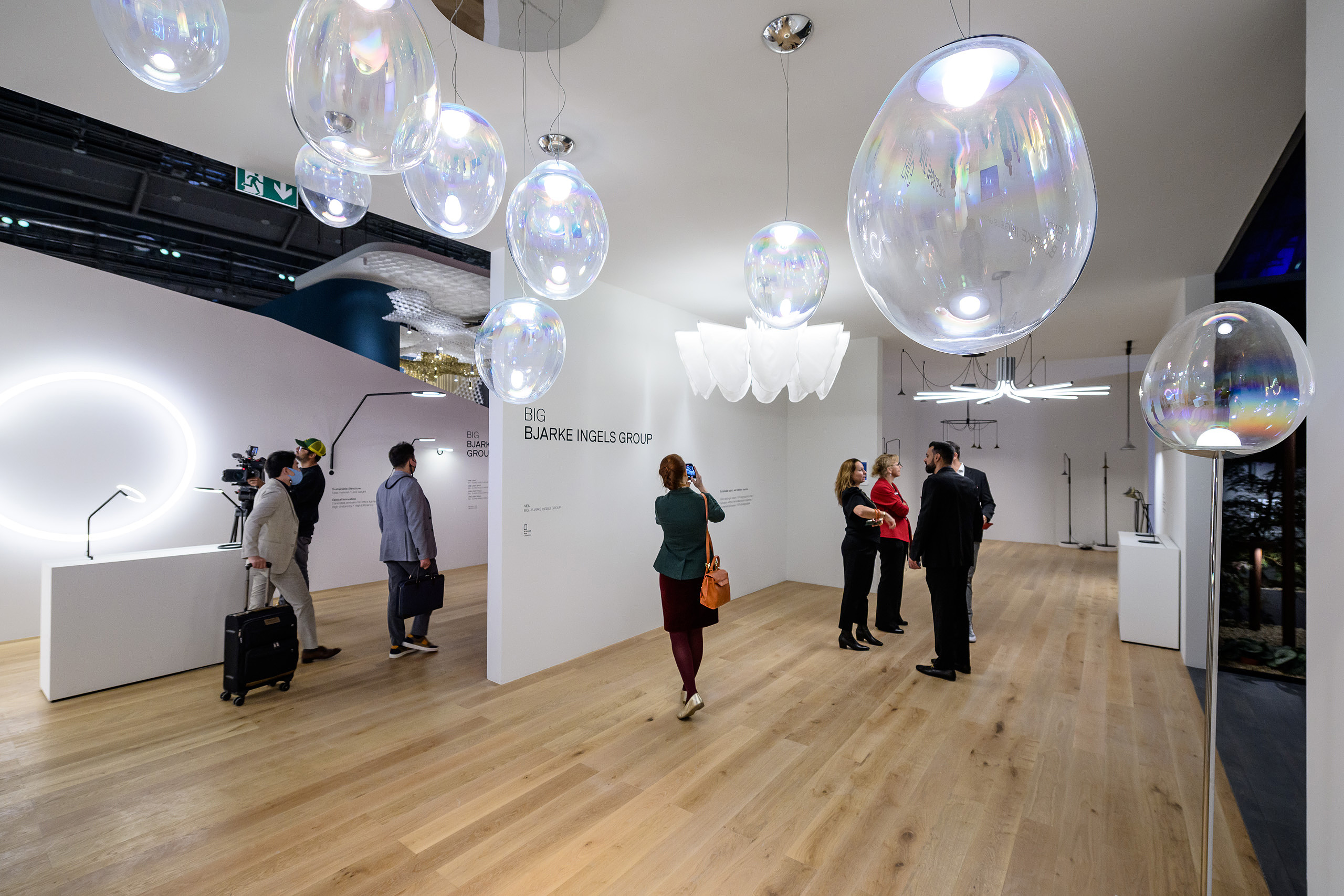 Beautiful hand-crafted luminaires seem to float in the room like shimmering soap bubbles
